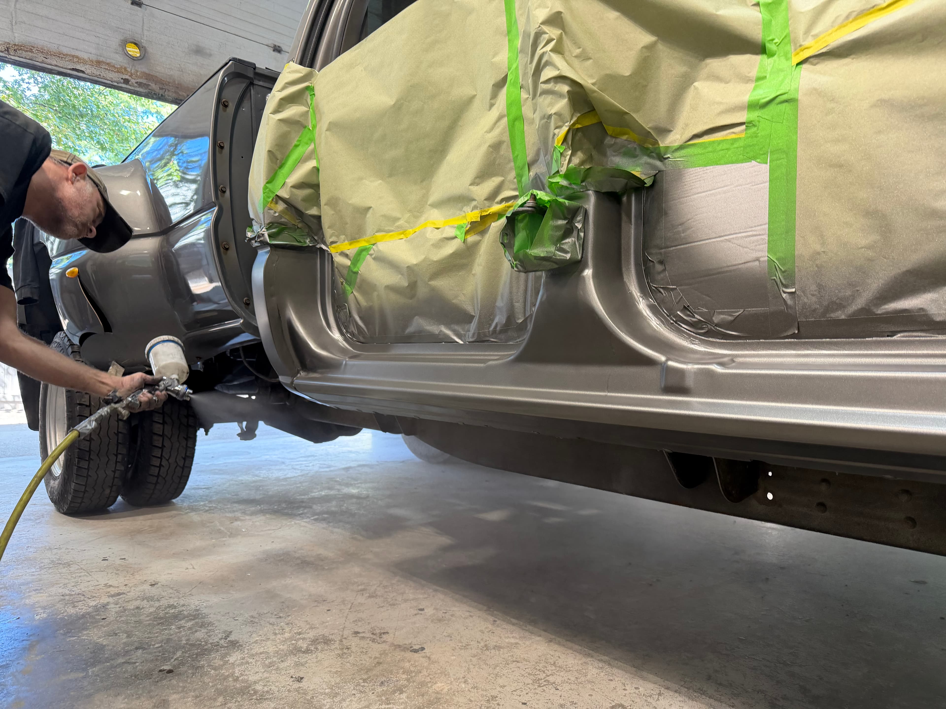 Rust repair and paint restoration in progress